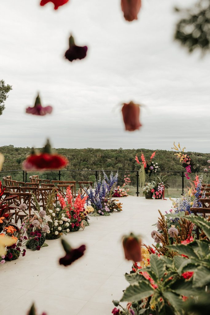A wedding weekend in Austin Texas at the Videre estate in the Hill country just outside of the city. The wedding day was an all day affair lots of personal touches and moments throughout the day made it special for the couple. Bold colorful florals, unique textures, rented plants, and unique designs made this wedding a truly one of a kind event. 